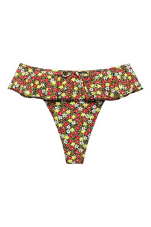 Floral bikini bottom with red, yellow, and white flowers on dark background and ruffled off-shoulder neckline.