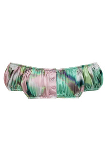 Bandita bikini top with watercolor tie-dye pattern in pink, green, and gray tones, featuring puffed sleeves and button center