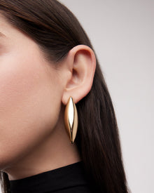 Small Puffy Dagger Earrings earring - styled on model | 18k gold earrings