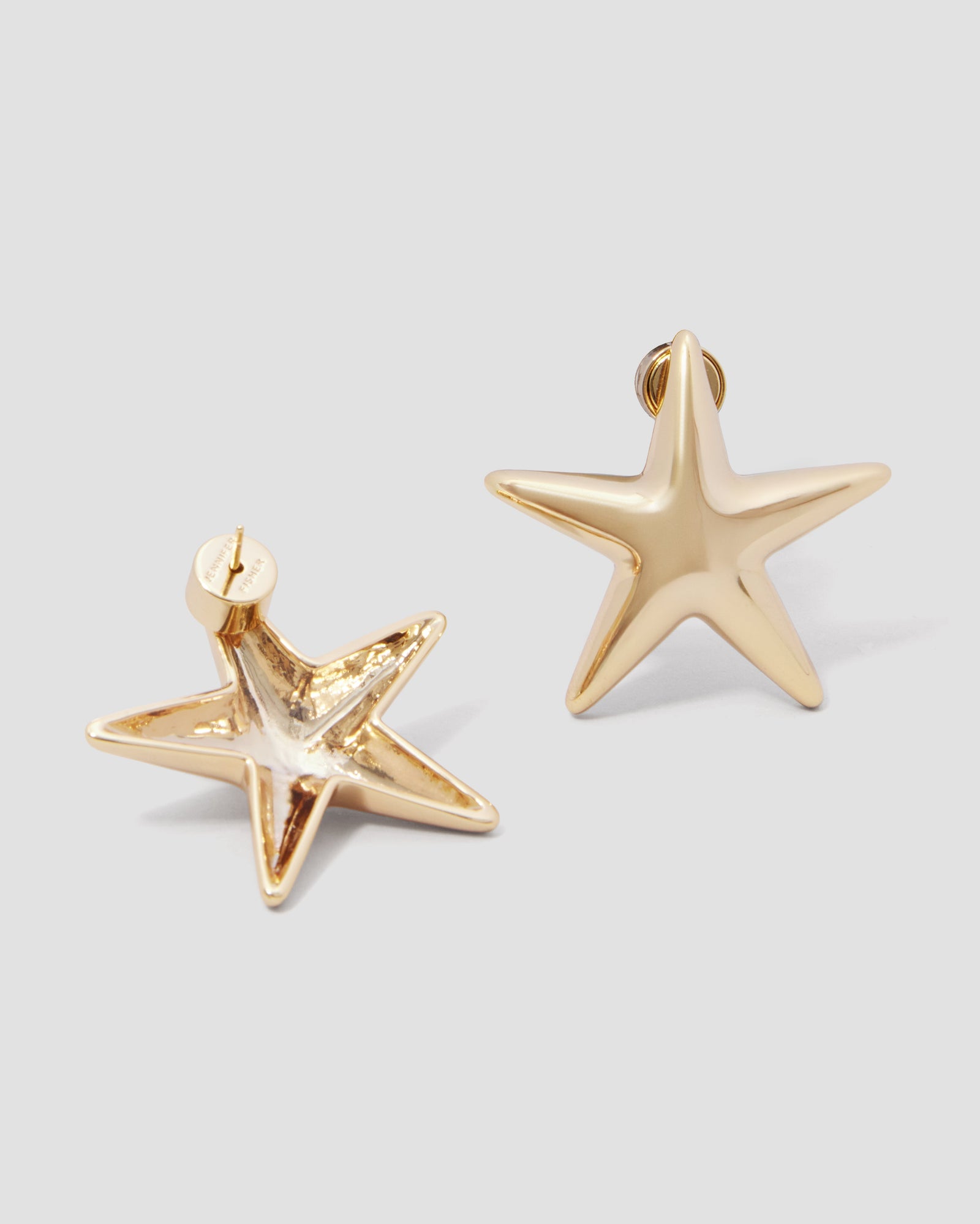 Puffy Star Earrings earring - styled on model | gold earrings for women