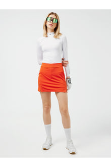 Women | Amelie Mid Golf Skirt | Tangerine Tango