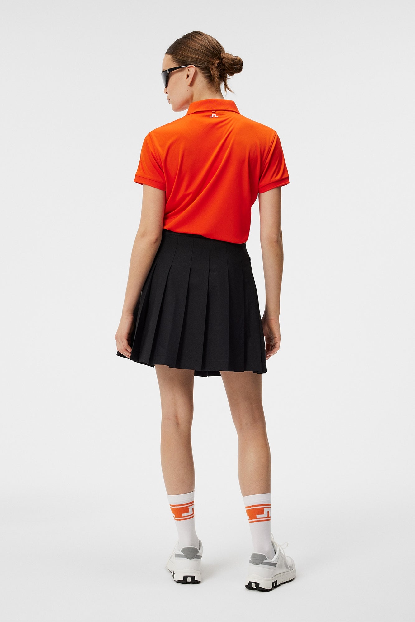 Women | Tour Tech Polo | Tangerine Tango