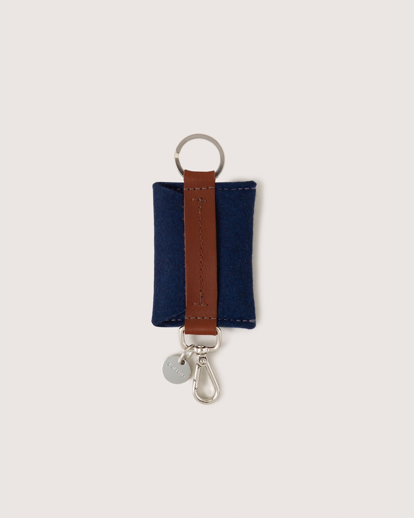 Marine Merino Wool Card Key Fob with silver colored Lobster Clasp, Flat Wide Keyring, and Logo Tog Tag, white background.