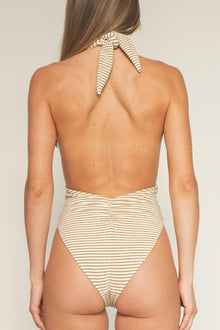 Beige and white striped one-piece swimsuit with tie-up halter neck and open back.