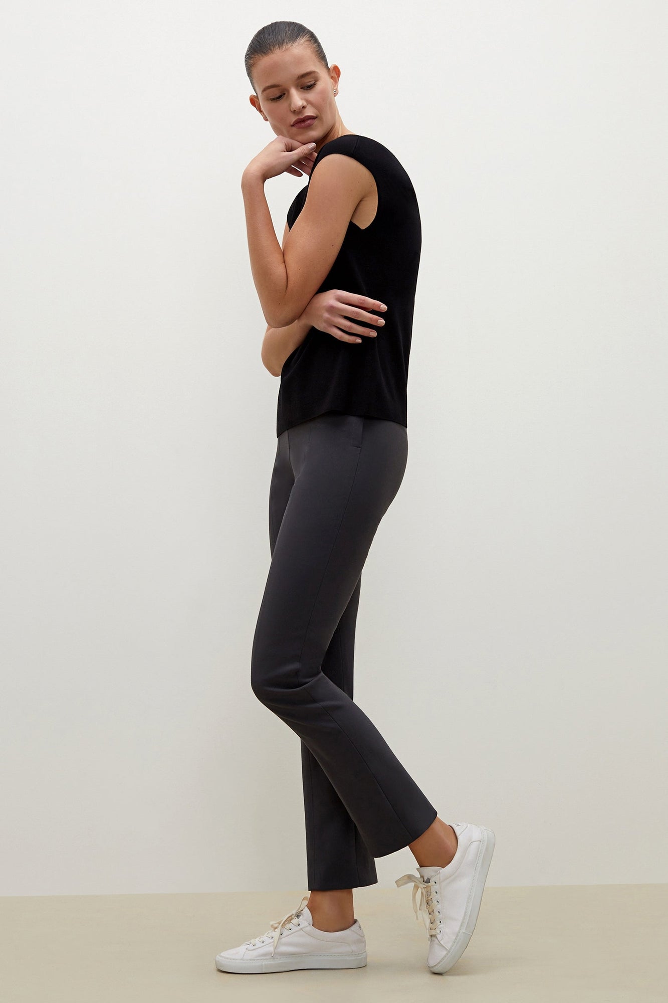 Side image of a woman wearing the Foster Pant - Everstretch  in Monsoon | Grid Hover | Exclude