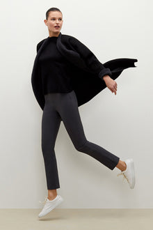 Side image of a woman wearing the Foster Pant - Everstretch  in Monsoon | Exclude