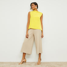 Front image of a woman standing wearing the Daisy Top—Washable Silk in Sunshine