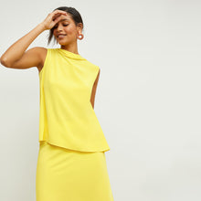 Front image of a woman standing wearing the Daisy Top—Washable Silk in Sunshine | Lead