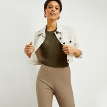 Front image of a woman standing wearing the avery top in safari