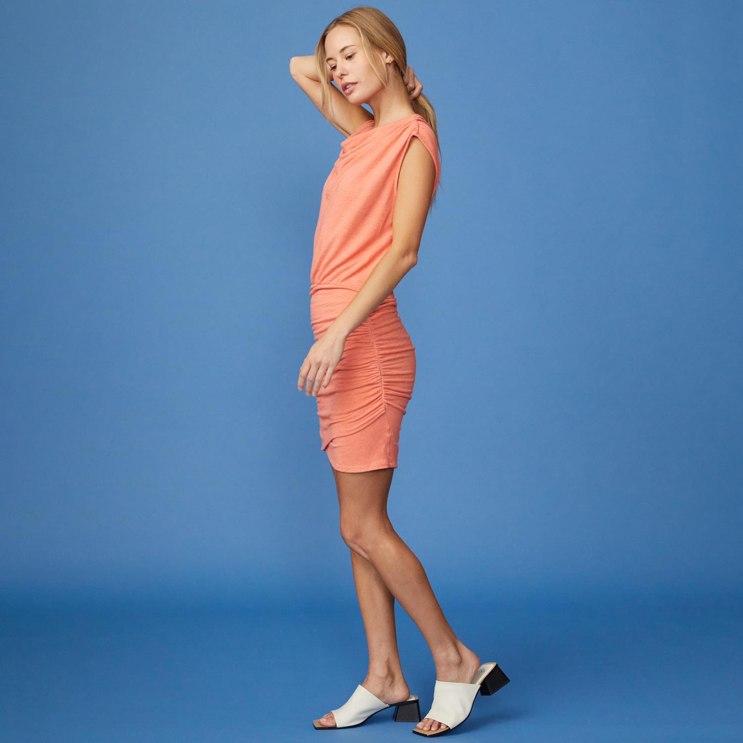 Side View of model wearing the Supersoft Cowl Shirred Wrap Dress in Georgia Peach