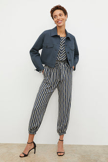Front image of a woman wearing the Anna Jacket - Better Than Denim in Dusty Indigo | Grid Hover | Exclude