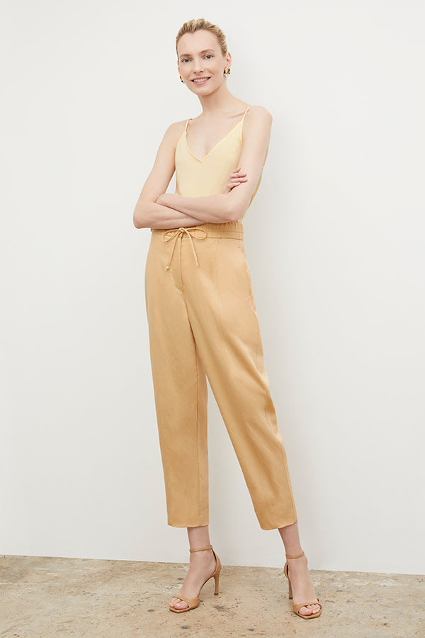 Front image of a woman wearing the Shane Pant - Everyday Twill in Butter | Grid | Exclude