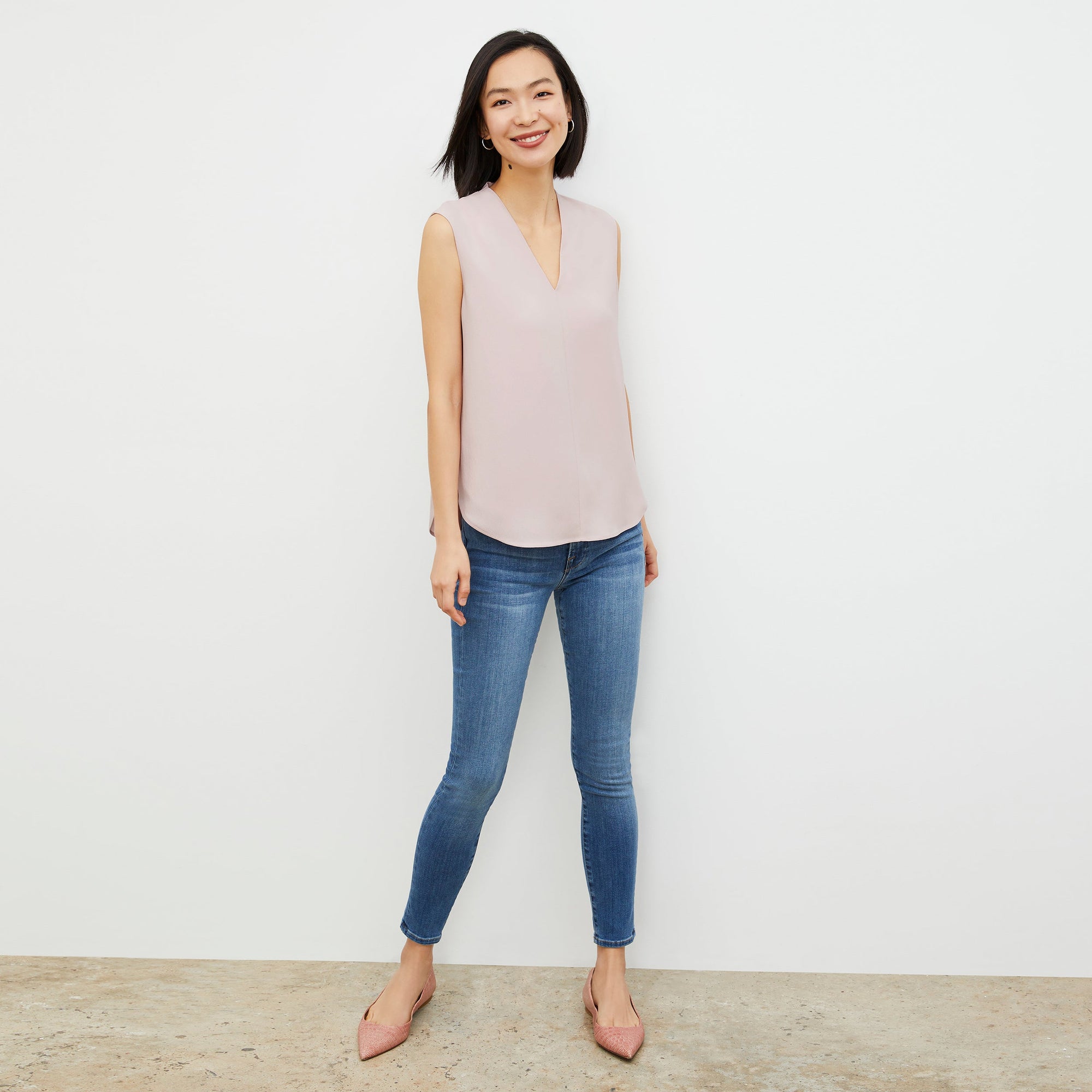 Front image of a woman wearing the Emmy Top in Blossom | Lead