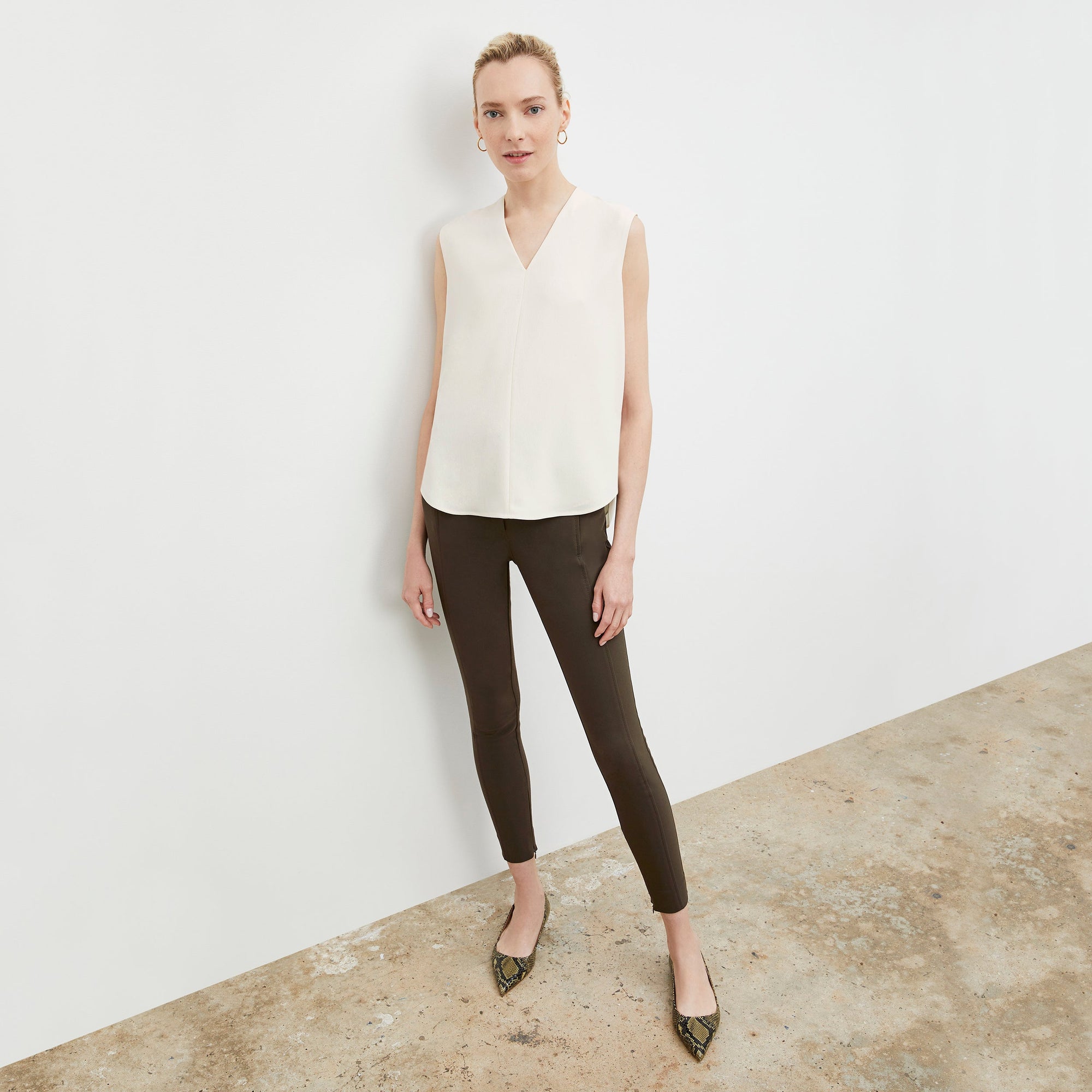 Front image of a woman wearing the Emmy Top in Alabaster | Lead
