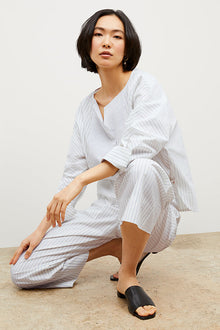 Image of a woman wearing the Chiara Top in Blue / Ivory | Exclude