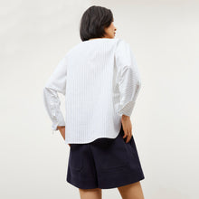 Image of a woman wearing the Chiara Top in Blue / Ivory