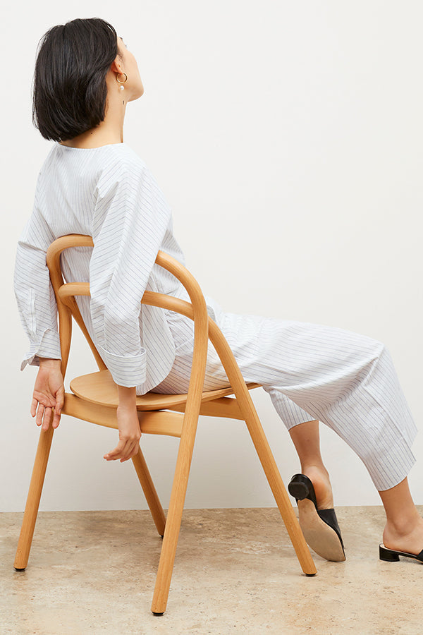 Image of a woman wearing the Chiara Top in Blue / Ivory | Exclude