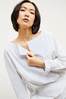 Image of a woman wearing the Chiara Top in Blue / Ivory | Grid Hover | Exclude