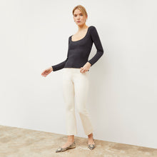 Front image of a woman wearing the Meg Top in Cool Onyx