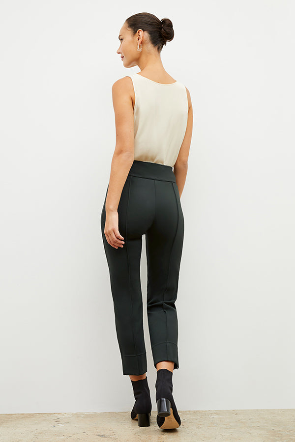 Back image of a woman wearing the robin pant in forest | Exclude