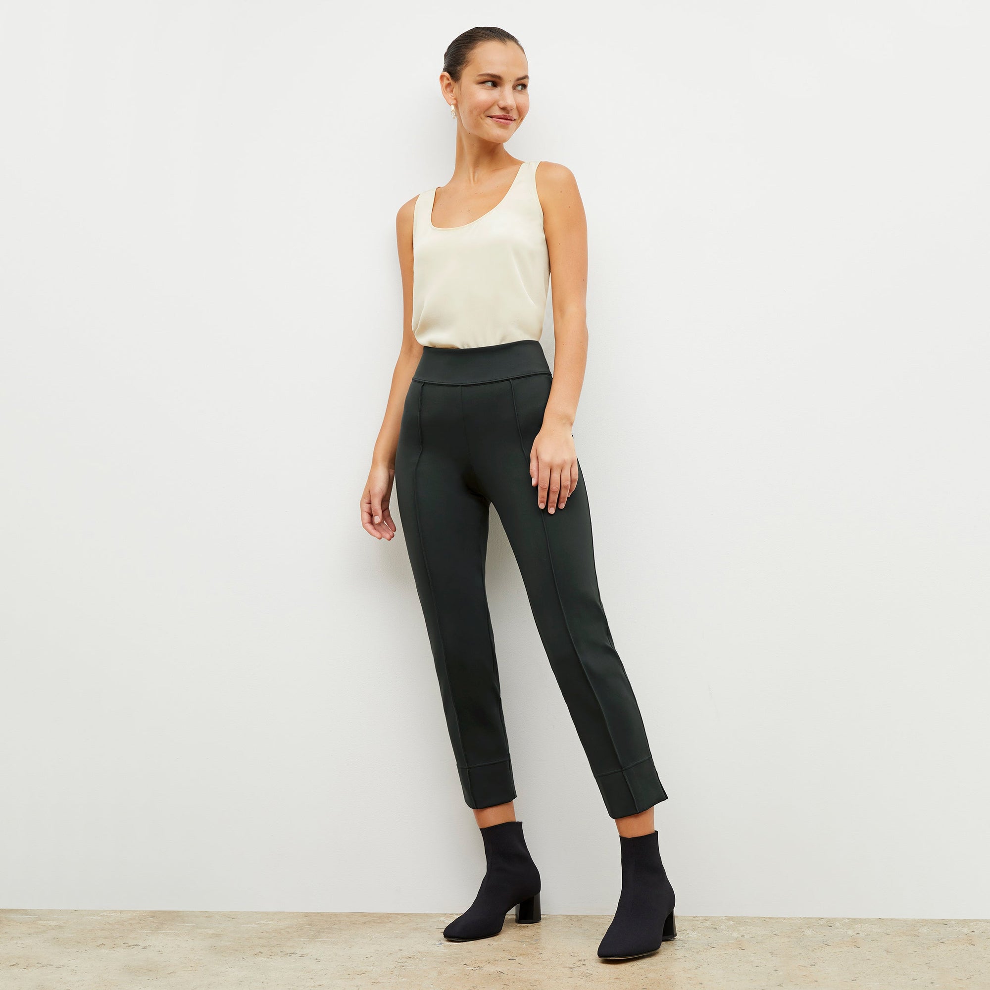 Front image of a woman wearing the robin pant in forest | Lead