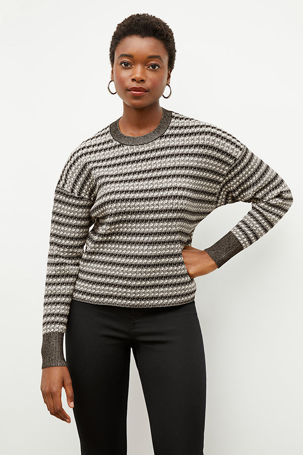Front image of a woman wearing the tyler sweatshirt in black and white | Exclude