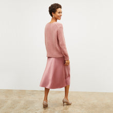 Back image of a woman wearing the orchard skirt in vintage rose | Exclude