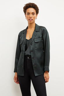 Image of a woman wearing the Alyssa Jacket in Hunter | Exclude | Grid Hover