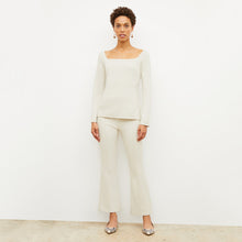 Front image of a woman wearing the jace top in pearl | Lead