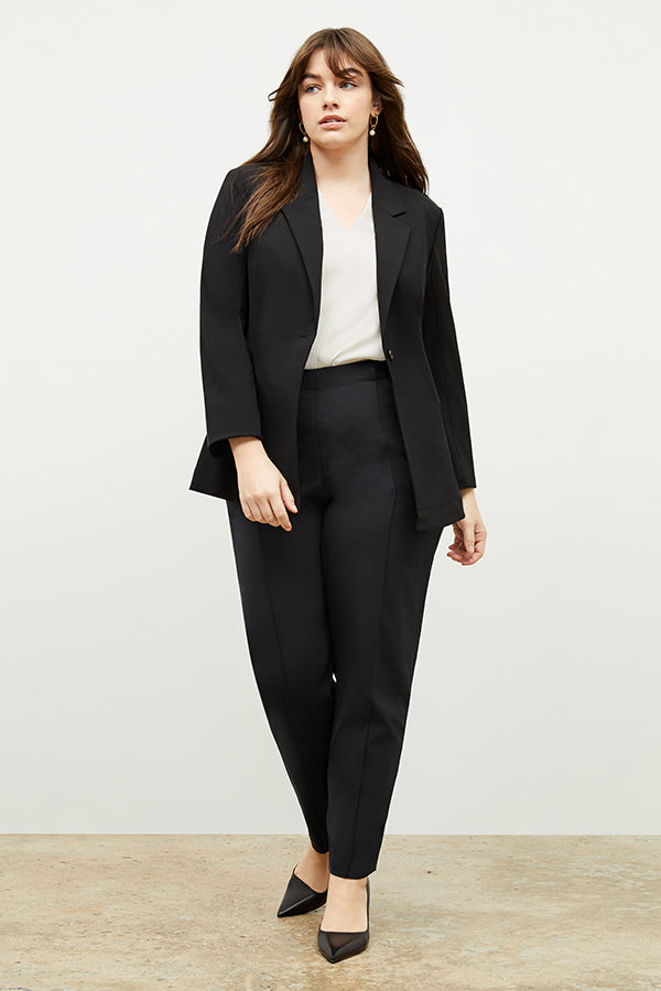 Front image of a woman wearing the Emmy Top in Alabaster | Exclude