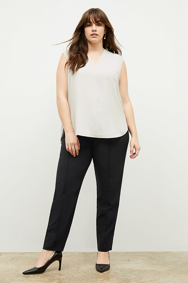 Front image of a woman wearing the Emmy Top in Alabaster | Exclude