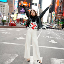 Front image of a woman wearing the lisey top in cutout print